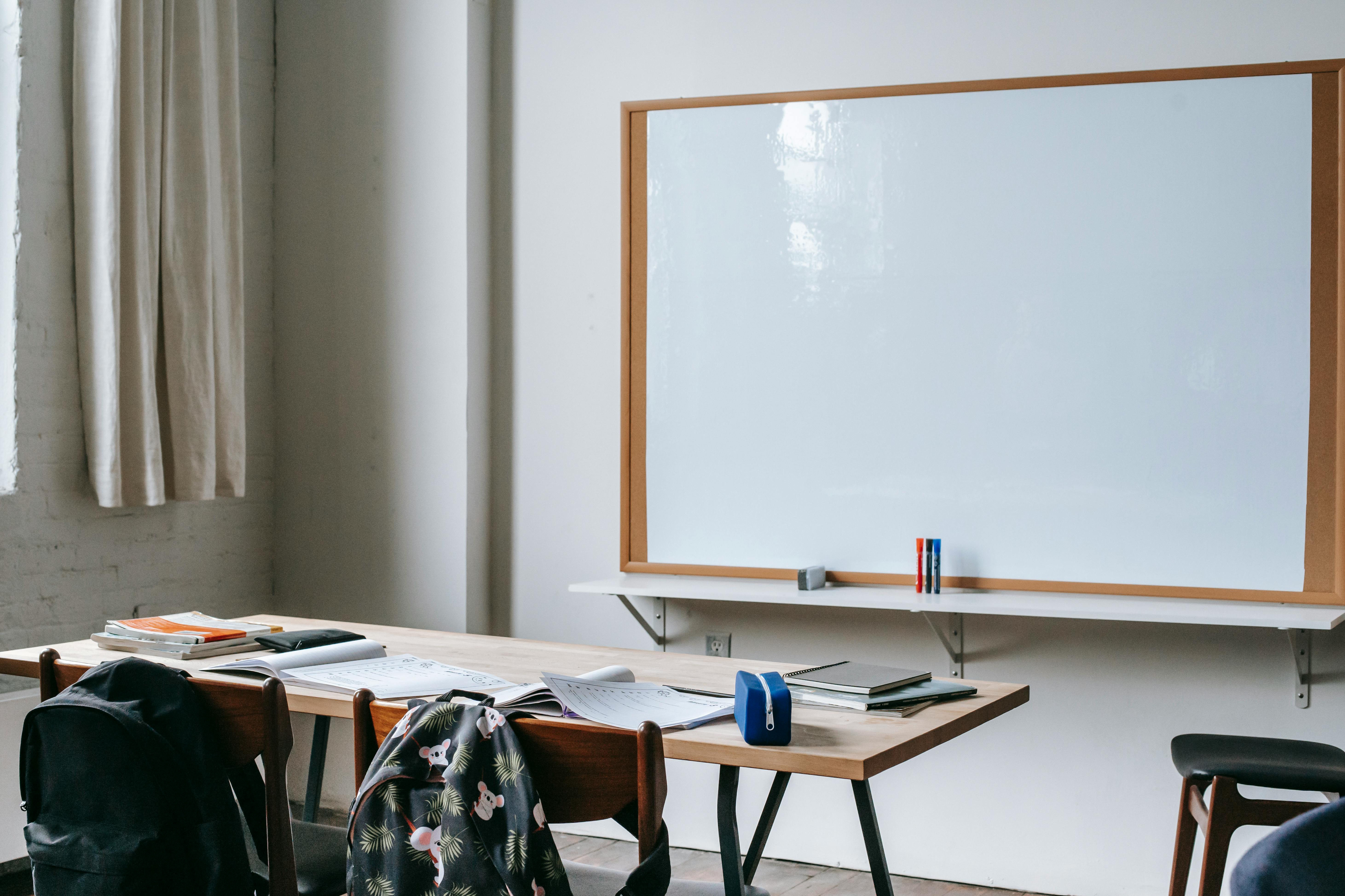 Students using AI-powered educational technology in a modern classroom