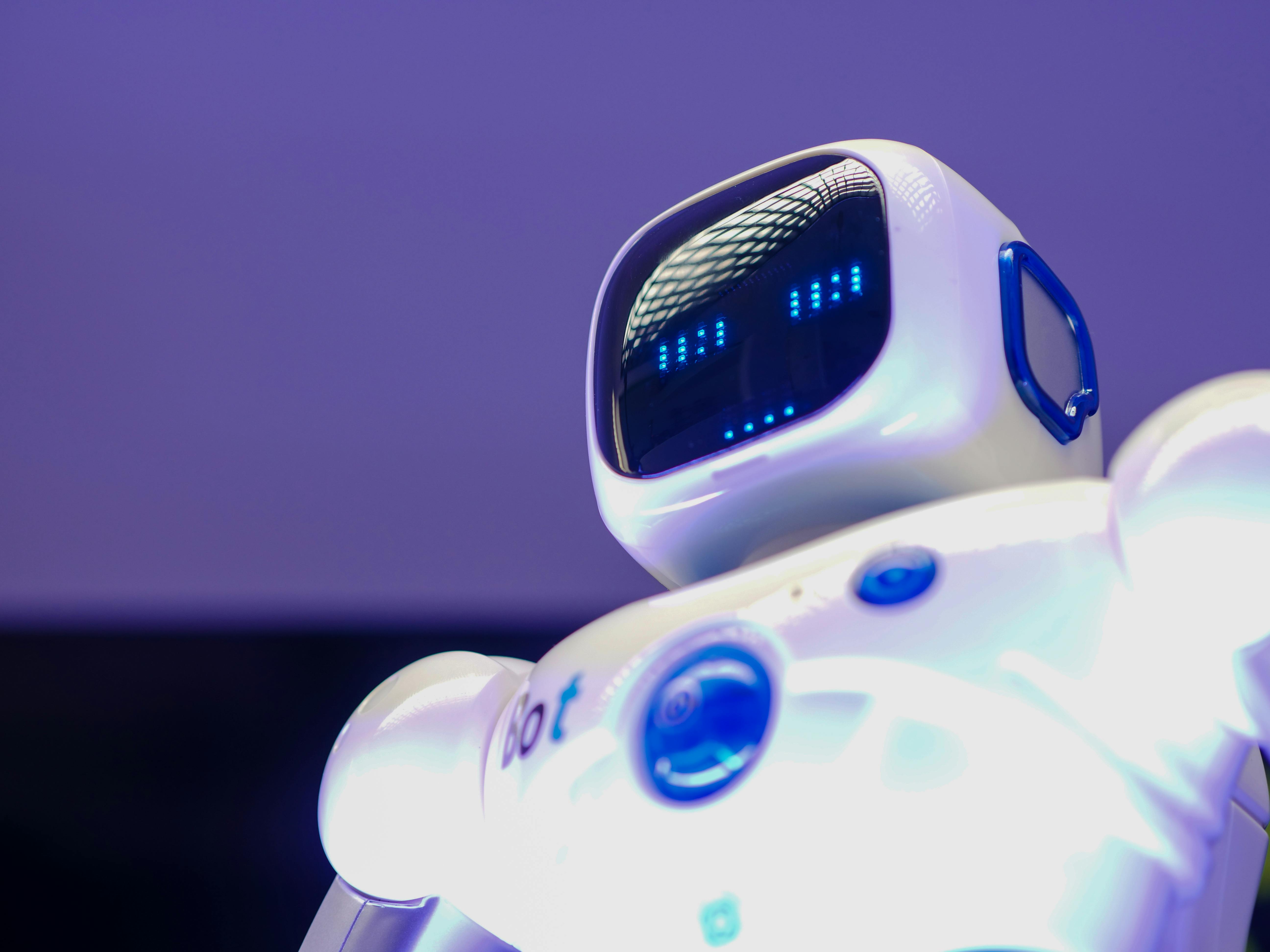 AI-powered robot working alongside humans in a modern facility